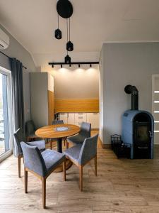 Khu vực ghế ngồi tại Apartamenty i domki Świerkowe