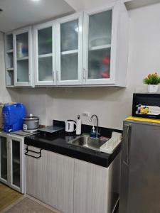 Kuchyň nebo kuchyňský kout v ubytování Athena's Place - Hope Residences SMDC Trece Cavite + 3 fotografie