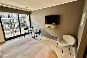 Φωτογραφία από το άλμπουμ του Diseño y conectividad, tu espacio en Santiago σε El Cerrillo