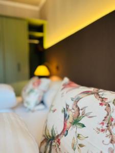 Giường trong phòng chung tại DAHUAM SUITES GERLOS Ski in Appartements mit BalkonITerrasse +29 ảnh