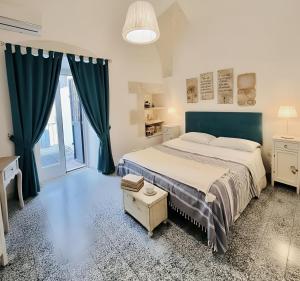 Ένα ή περισσότερα κρεβάτια σε δωμάτιο στο Casa Agrumeto 28