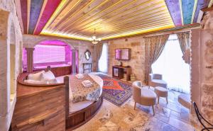 Posezení v ubytování Noble Crown Stone House Cappadocia + 28 fotografií