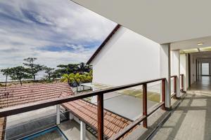 Μπαλκόνι ή βεράντα στο Super OAK Edassery's Sealine Villa Stay +118 φωτογραφίες