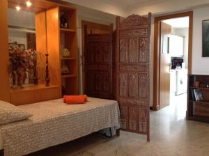 A bed or beds in a room at Lets Holidays Apartment Sea Views in Barcelona