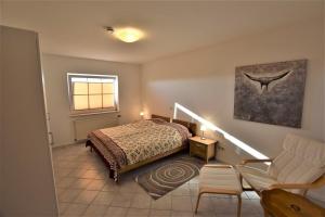 Ένα ή περισσότερα κρεβάτια σε δωμάτιο στο Bernstein-Chalet unten