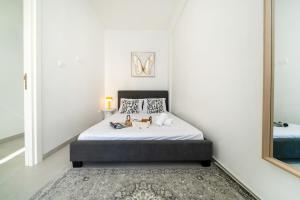 Giường trong phòng chung tại Central 2 bedroom flat