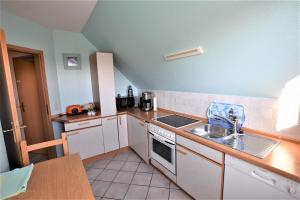 Η κουζίνα ή μικρή κουζίνα στο Bernstein-Chalet oben