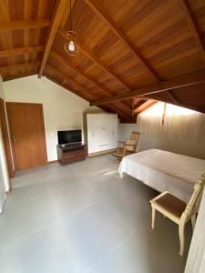 Et tv og/eller underholdning på Kitnet Completa Com Vista Para o Lago