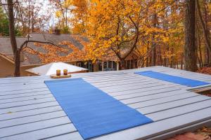 a metal roof with blue mats on top of it at Green Mountain Song-Massanutten Mountain in McGaheysville