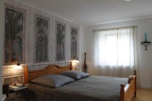 Una cama o camas en una habitación de Peterlhof-Pietling