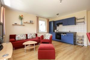 Kuchyň nebo kuchyňský kout v ubytování Urlauberdorf Haus 60c