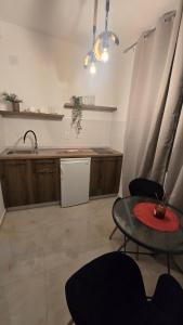 Kuchyň nebo kuchyňský kout v ubytování Mala Atina