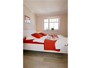 Postel nebo postele na pokoji v ubytování Neue Reihe 28 - Wohnung Kleine Auszeit