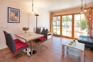 Khu vực ghế ngồi tại Ferienpark Freesenbruch Wohnung 1 2 - Am Schwalbenweg