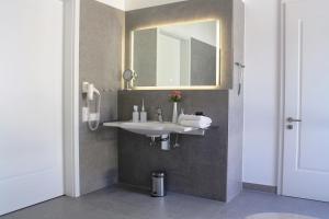 Koupelna v ubytování Logierhaus Friedrich WE 01 - "Beachhouse No 1" + 26 fotografií