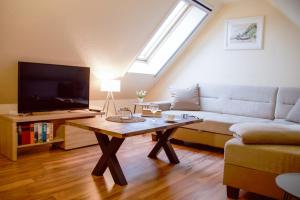 Μια τηλεόραση ή/και κέντρο ψυχαγωγίας στο Ferienpark Freesenbruch Wohnung 1 4 -Ferienzeit