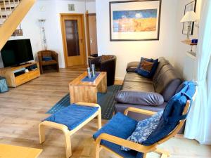 Posezení v ubytování Ferienpark Freesenbruch Reihenhaus 6 - Delfin