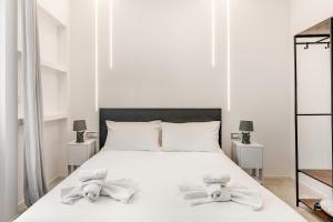 Giường trong phòng chung tại Appt Monolocale Mare & Gaslini Wi-Fi Veloce