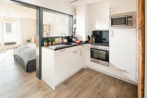 Η κουζίνα ή μικρή κουζίνα στο Strandzeit 13