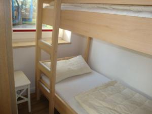 Postel nebo postele na pokoji v ubytování TRA7b "Residenz Windrose"