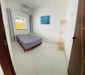 Ένα ή περισσότερα κρεβάτια σε δωμάτιο στο Casa Arembepe Prime +6 φωτογραφίες