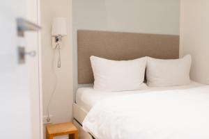 Ένα ή περισσότερα κρεβάτια σε δωμάτιο στο SeaScape +26 φωτογραφίες