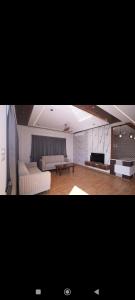 Posezení v ubytování 69th Heaven Hotel + 5 fotografií