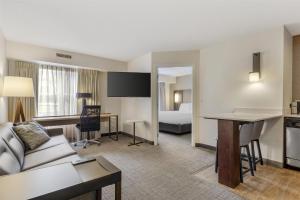 Ένα ή περισσότερα κρεβάτια σε δωμάτιο στο Sonesta ES Suites Fairfax Fair Lakes +63 φωτογραφίες