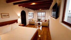 TV a/nebo společenská místnost v ubytování Casa Lucía Hotel by Las Plazas