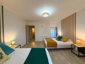 Foto sihtkohas Valognes asuva majutusasutuse La Pierre de Valognes à 4 min de la gare galeriist