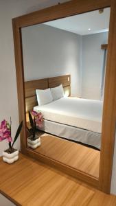 Ένα ή περισσότερα κρεβάτια σε δωμάτιο στο Hotel Parguito