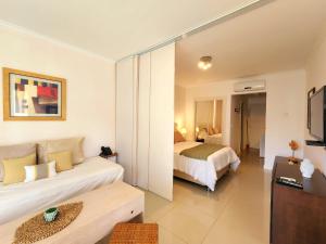 Ένα ή περισσότερα κρεβάτια σε δωμάτιο στο Green Park Complejo Solanas +12 φωτογραφίες