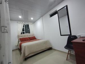 Postel nebo postele na pokoji v ubytování D habitación con baño privdo