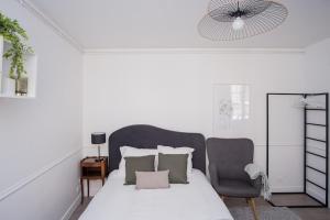 Postel nebo postele na pokoji v ubytování Phénix - SILS