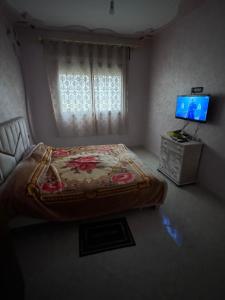 Postel nebo postele na pokoji v ubytování appartement location vacances Tanger