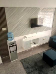 Ένα ή περισσότερα κρεβάτια σε δωμάτιο στο Vegaz Suites, The home of royal audacious comfort