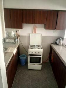 Η κουζίνα ή μικρή κουζίνα στο Vegaz Suites, The home of royal audacious comfort