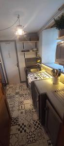 Η κουζίνα ή μικρή κουζίνα στο Gite De Charme Oliabou