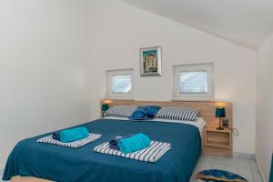 Ένα ή περισσότερα κρεβάτια σε δωμάτιο στο Apartments Beach house Blace