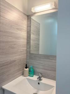 Koupelna v ubytování L'Écrin Signature, Studio élégant en centre-ville