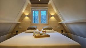 Ένα ή περισσότερα κρεβάτια σε δωμάτιο στο de bosdriehoek +47 φωτογραφίες