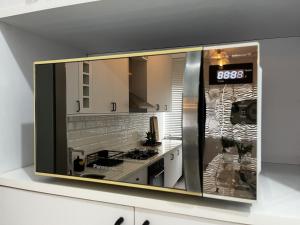 Η κουζίνα ή μικρή κουζίνα στο VR requinte total ar e garagem +46 φωτογραφίες