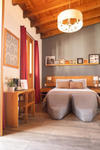 Una cama o camas en una habitación de Hotel bugambilias