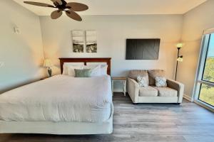 Una cama o camas en una habitación de Luau 6711