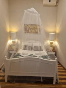 Ένα ή περισσότερα κρεβάτια σε δωμάτιο στο Chalé Quitxiba