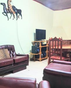 TV a/nebo společenská místnost v ubytování Casona