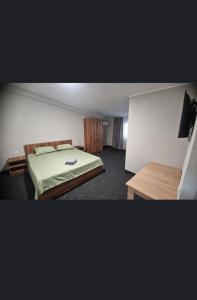 Postel nebo postele na pokoji v ubytování Bașcov S&D