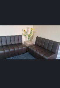 Posezení v ubytování Bașcov S&D