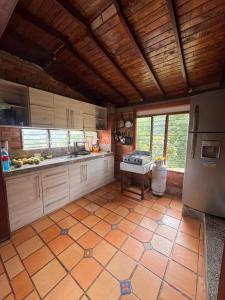 Η κουζίνα ή μικρή κουζίνα στο Finca Lago Calima