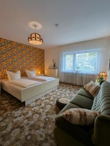 Ένα ή περισσότερα κρεβάτια σε δωμάτιο στο PRIMA Quartier +30 φωτογραφίες